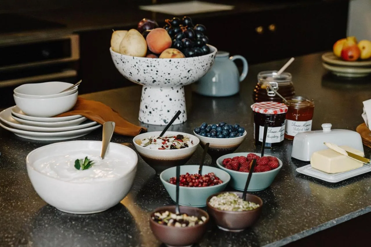 Breakfast counter with fruit and bowls at Mason & Fifth, Primrose Hill